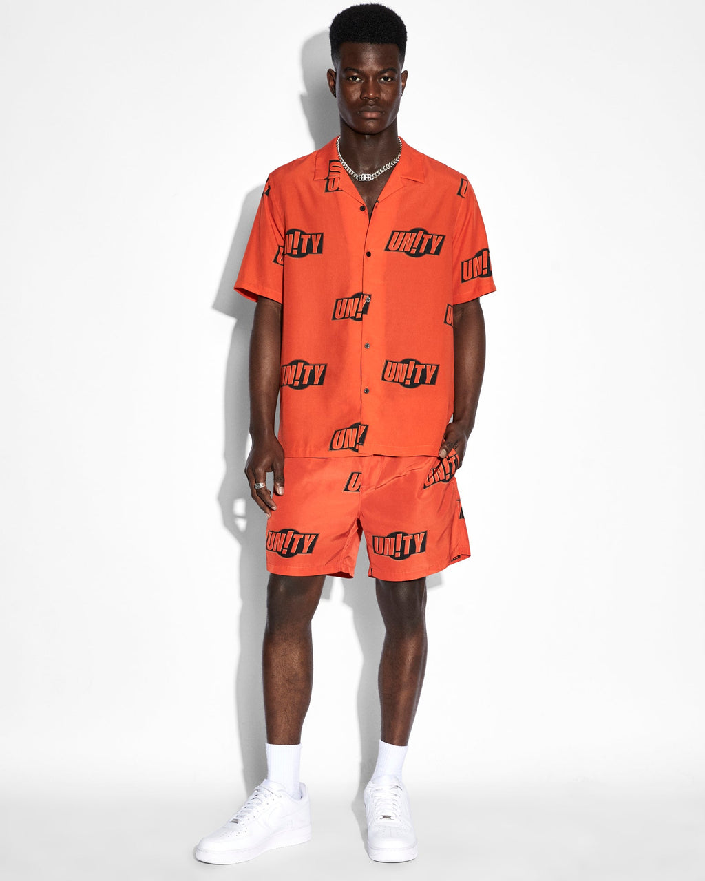 MENS UNITY SIGN RESORT SS SHIRT ORANGE SHIRTS