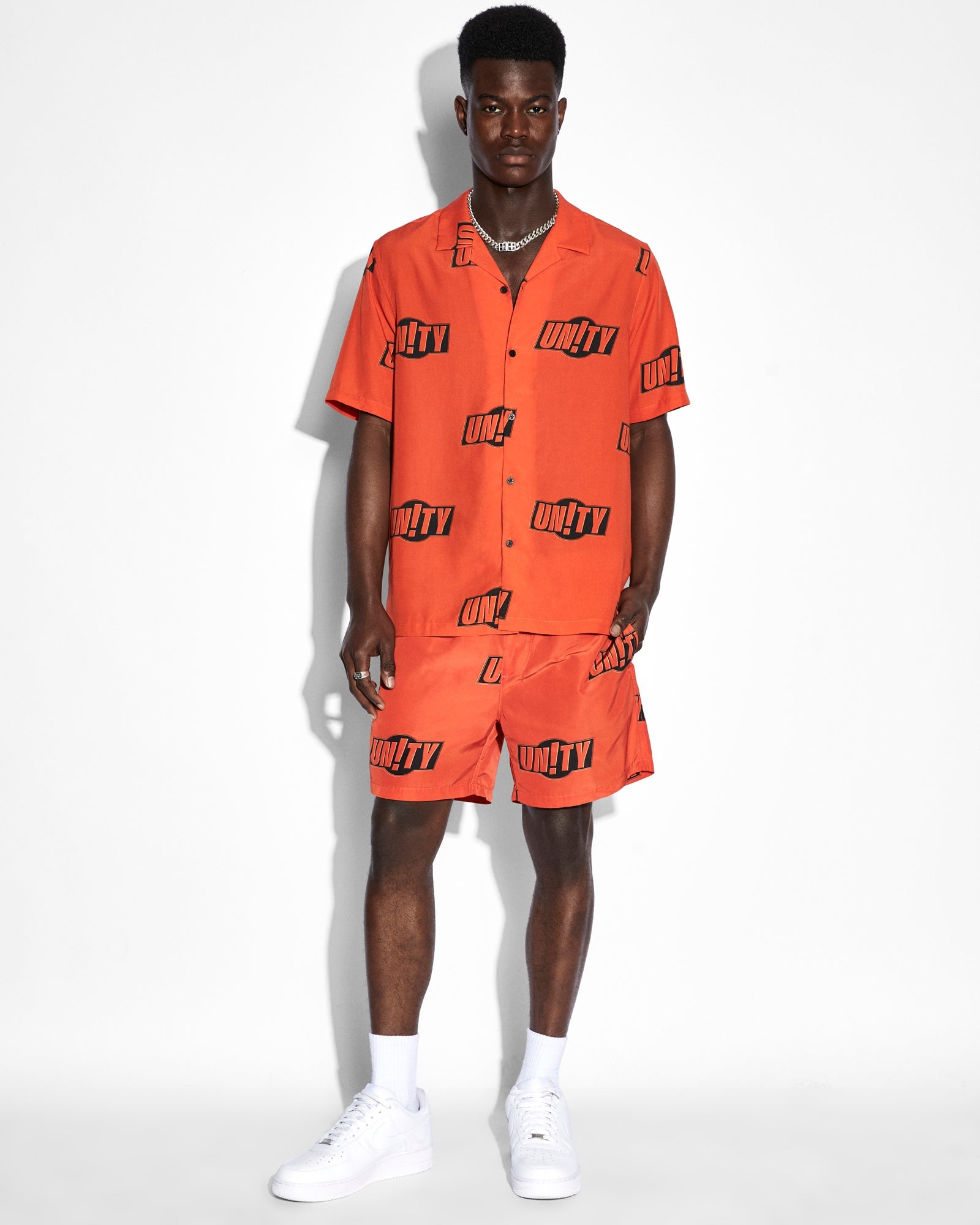 MENS UNITY SIGN RESORT SS SHIRT ORANGE REGULAR SHIRTS